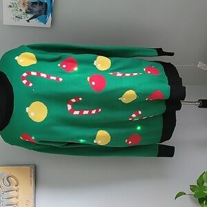 Festive Green Sweater with Holiday Ornaments